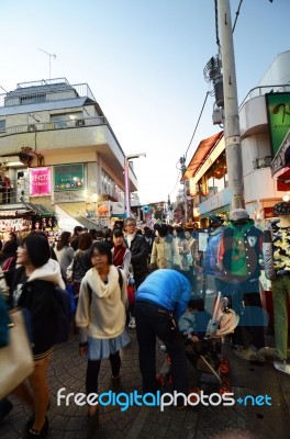 Tokyo - Nov 24 : People, Mostly Youngsters, Walk Through Takeshi… Stock Photo