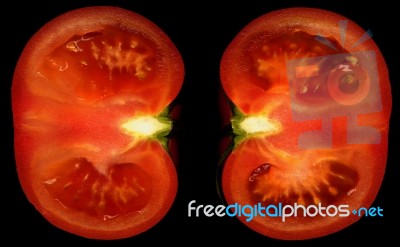 Tomato In Half Stock Photo