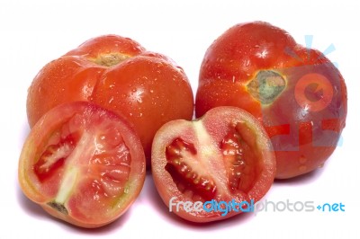 Tomatoes On White Stock Photo