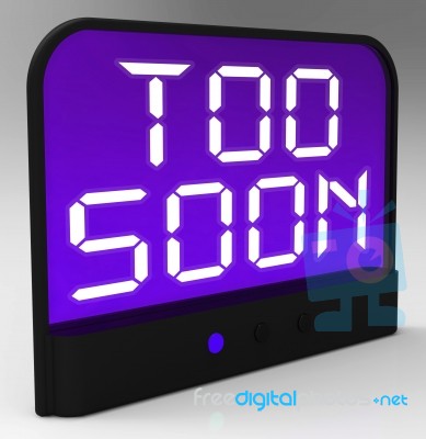 Too Soon Clock Shows Premature Or Ahead Of Time Stock Image