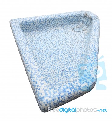 Top Of Blue Tile Mosaic Pool And Faucet On White Background Stock Photo