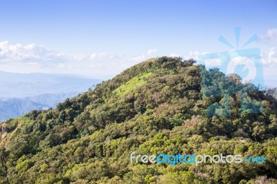 Top Of Mountain With Beautiful Sky Stock Photo