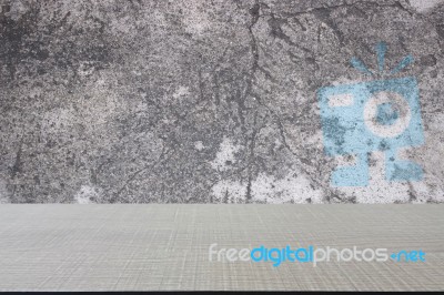 Top Of Wood Table On Old Concrete Wall Background Stock Photo