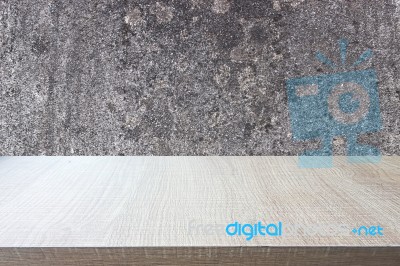 Top Of Wood Table On Old Concrete Wall Background Stock Photo