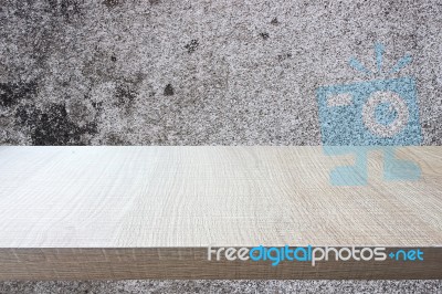 Top Of Wood Table On Old Concrete Wall Background Stock Photo