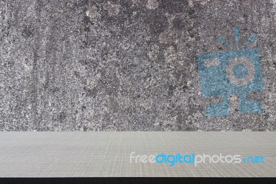 Top Of Wood Table On Old Concrete Wall Background Stock Photo