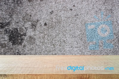 Top Of Wood Table On Old Concrete Wall Background Stock Photo