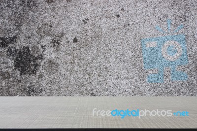 Top Of Wood Table On Old Concrete Wall Background Stock Photo