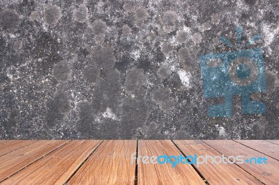 Top Of Wood Table On Old Concrete Wall Background Stock Photo