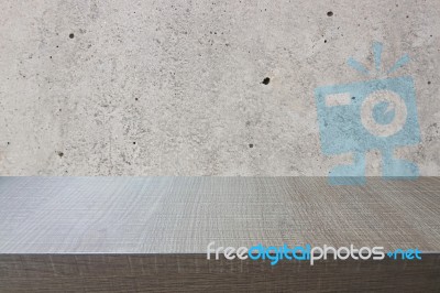 Top Of Wood Table On Old Concrete Wall Background Stock Photo