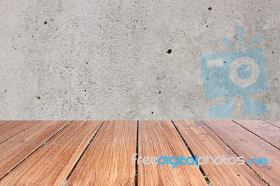 Top Of Wood Table On Old Concrete Wall Background Stock Photo