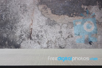 Top Of Wood Table On Old Concrete Wall Background Stock Photo