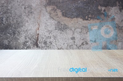 Top Of Wood Table On Old Concrete Wall Background Stock Photo