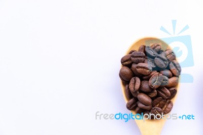 Top View Close Up Coffee Bean On Wooden Spoon Stock Photo