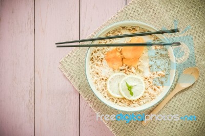 Top View Image Of Chinese Noodle In Bowl On Top Of Rustic Wood Stock Photo