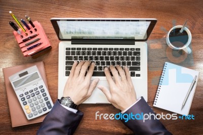 Top View Of Business Man Hands Working On Laptop Or Tablet Pc On… Stock Photo