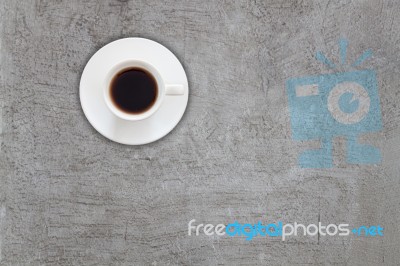 Top View Of Coffee Cup On Abstrsct Gray Concrete Background Stock Photo