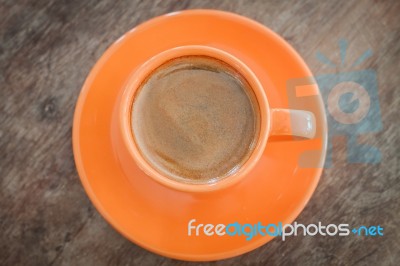 Top View Of Hot Coffee On Wooden Table Stock Photo