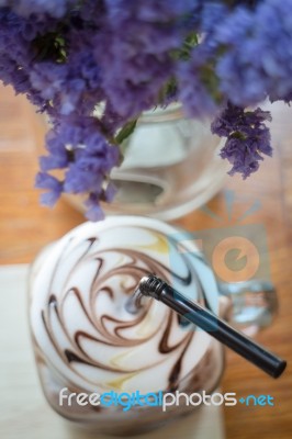 Top View Of Iced Coffee On Wooden Table Stock Photo