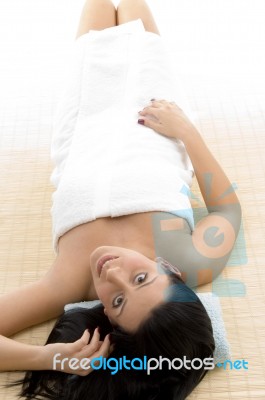 Top View Of Resting Woman Looking At Camera Stock Photo