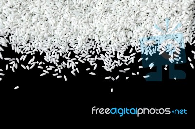 Top View Of Rice Seed On The Black Background For Isolated Stock Photo