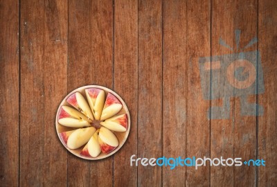 Top View Of Sliced Apple On Wooden Background Stock Photo