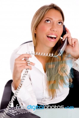 Top View Of Smiling Executive Busy On Phone Stock Photo