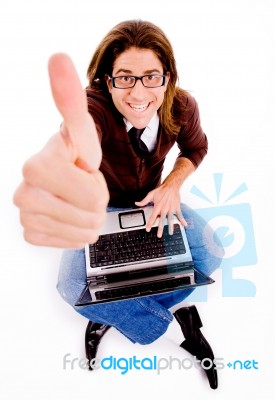 Top View Of Smiling Man With Thumbs Up And Laptop Stock Photo