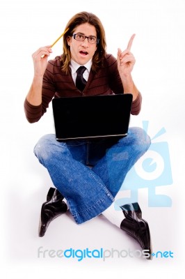 Top View Of Thinking Pointing Man Holding Pencil Stock Photo