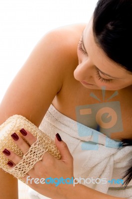 Top View Of Woman Scrubbing Her Arms On An Isolated White Background Stock Photo