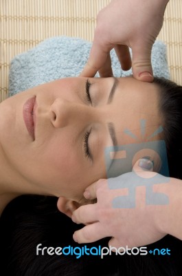 Top View Of Woman Taking Head Massage Stock Photo