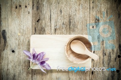 Top View Of Wooden Bowl On Old Wooden Background Stock Photo