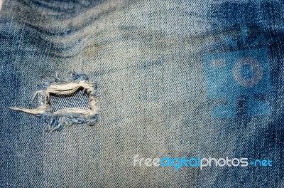 Torn Jeans Stock Photo