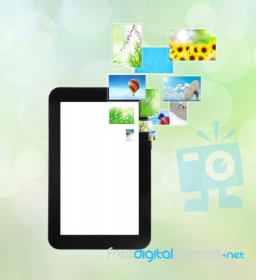 Touch Pad PC With Streaming Images Stock Image