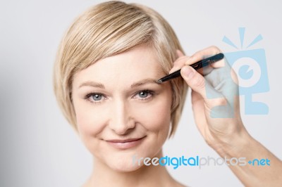 Touch Up My Eye Shadow Stock Photo