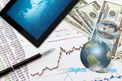 Touchpad On Financial Graphs. Stock Image