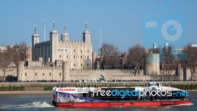 Tourist Boat Passing The Tower Of London Stock Photo