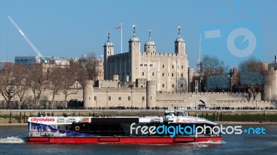 Tourist Boat Passing The Tower Of London Stock Photo