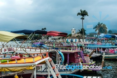 Tourist Boats Waiting For Tourists In Paraty, State Rio De Janei… Stock Photo