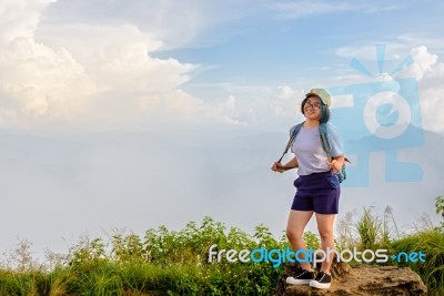 Tourist Teen Girl Poses On Mountain Stock Photo