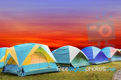 Tourist Tent With Beautiful Sunset Background Stock Photo