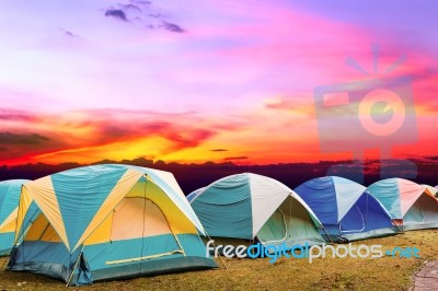 Tourist Tent With Beautiful Sunset Background Stock Photo