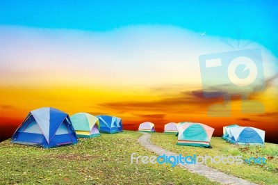 Tourist Tent With Beautiful Sunset Background Stock Photo