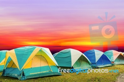 Tourist Tent With Beautiful Sunset Background Stock Photo