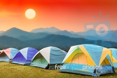 Tourist Tent With Beautiful Sunset Background Stock Photo