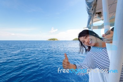 Tourist Woman Traveling By Boat Stock Photo