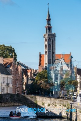 Tourists Enjoying A Boat Trip Around Bruges West Flanders In Bel… Stock Photo