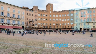 Tourists In Sienna Stock Photo