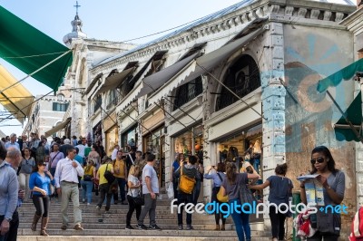 Tourists On The Rialto Bridge Venice Stock Photo