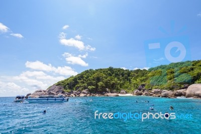 Tourists Snorkeling At The Similan Islands In Thailand Stock Photo